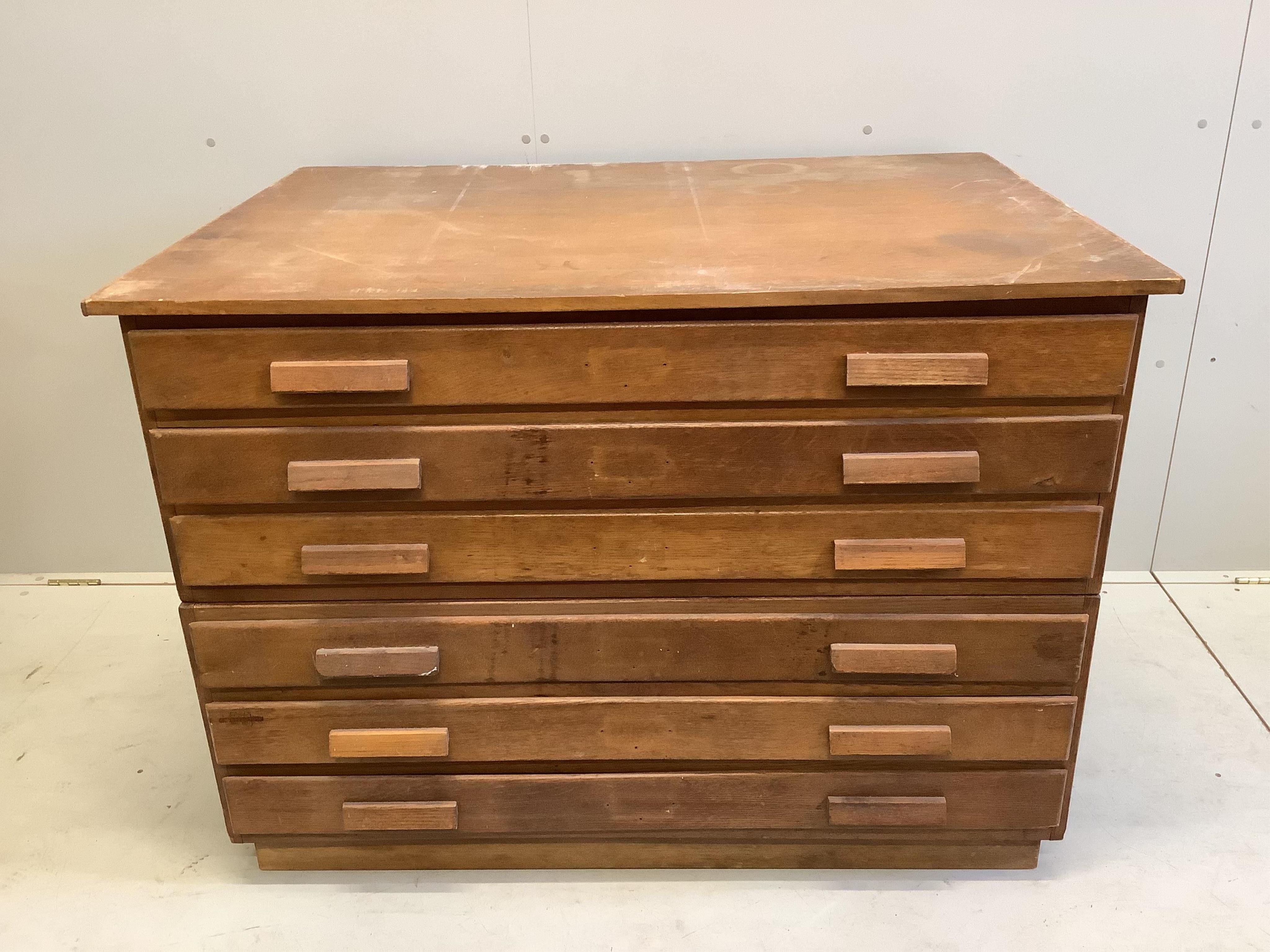 A mid century oak plan chest, width 120cm, depth 88cm, height 86cm